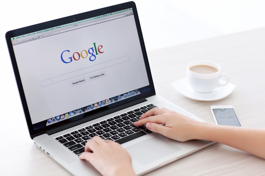 Macbook Pro Retina And Iphone 5S With Google Home Page On The Sc